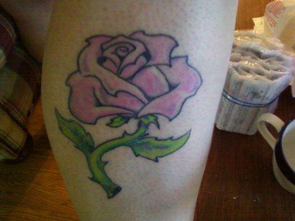 Mandy's rose tattoo