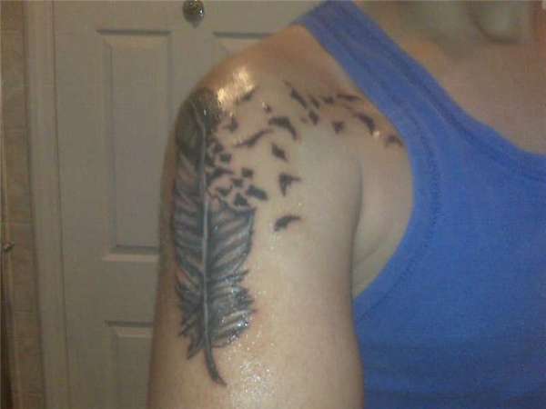Breaking Feather tattoo