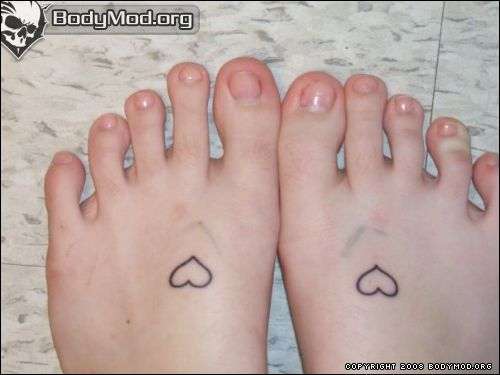 foot hearts tattoo
