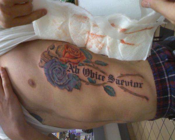 rib tat tattoo