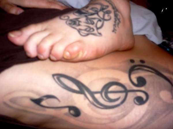 My first tattoo... (The one on the bottom) tattoo