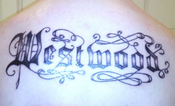 Back Text tattoo