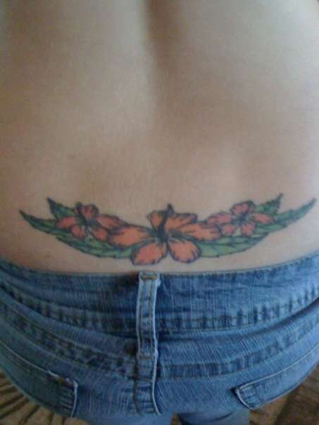 Flowers on lowerback tattoo