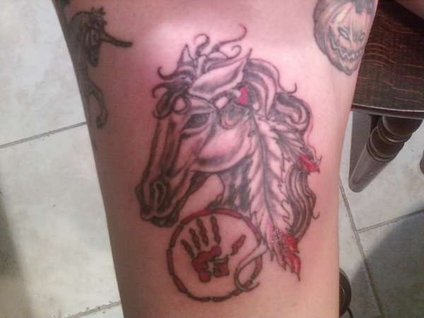 horse with warrior hand print tattoo