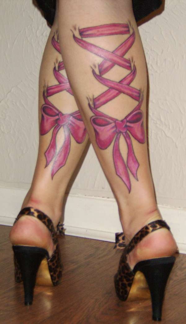Healed Corset Bow Tattoo's on my legs tattoo