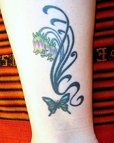 Flowers and a Butterfly tattoo
