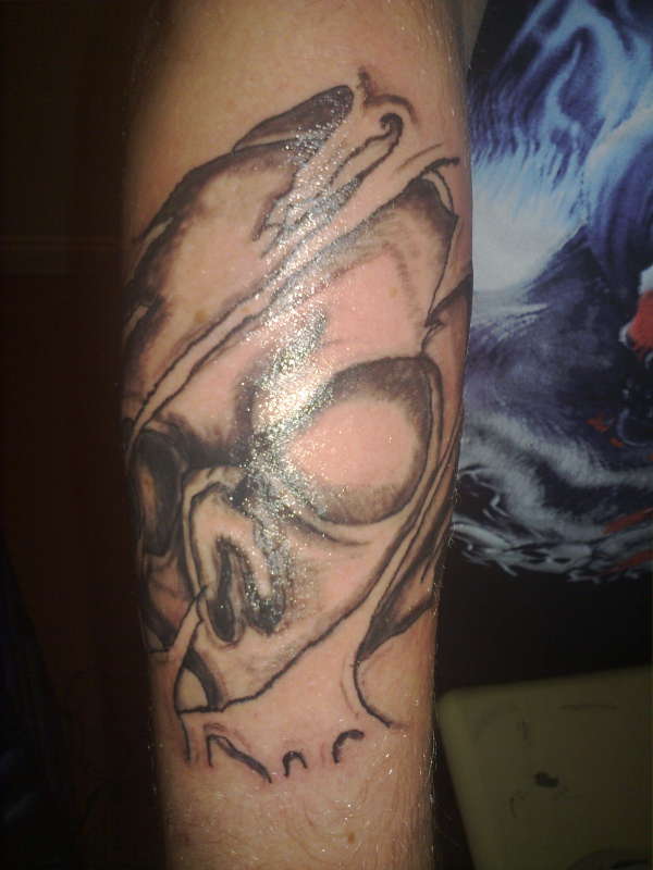 skull within tattoo