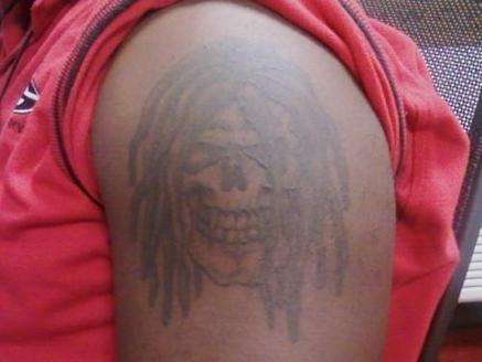 Skull W/Dreads tattoo