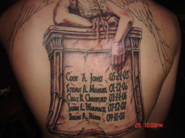 angel on tombstone tattoo