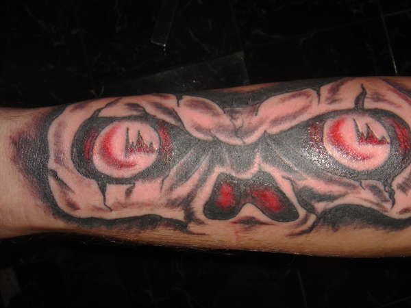 skull eyes tattoo