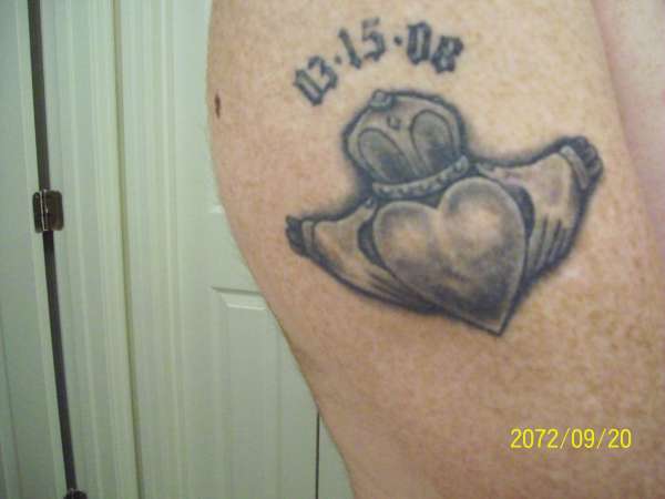 Claddagh with wedding date tattoo