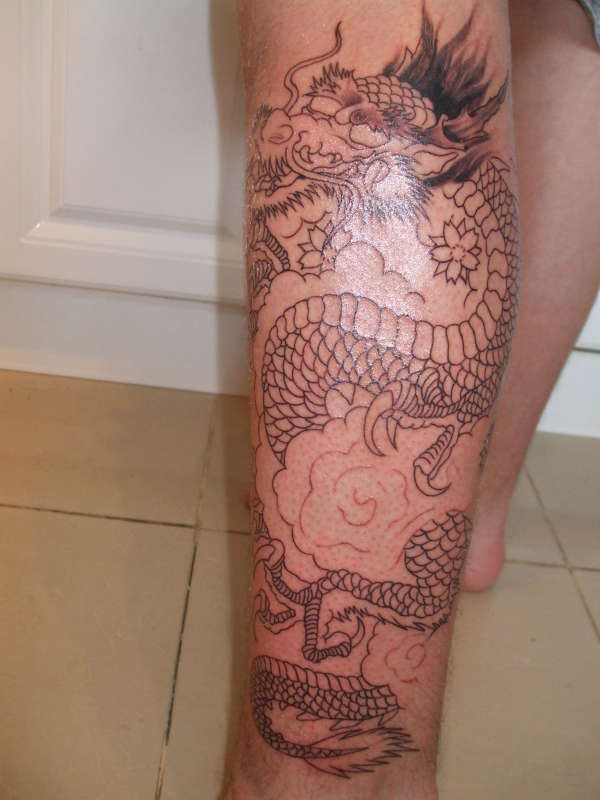 half finished dragon tattoo