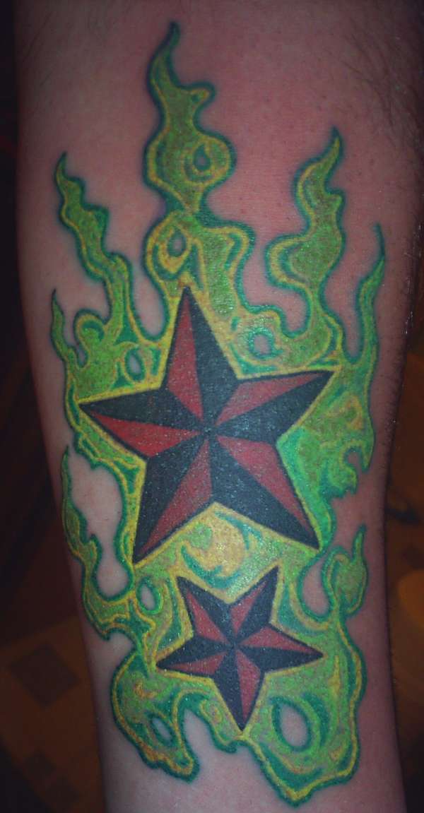 flaming stars tattoo