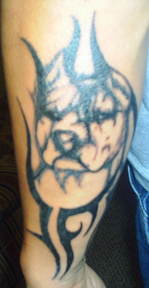 pit with tribal tattoo