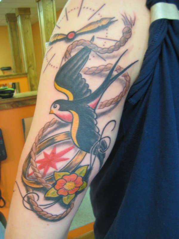 neo-traditional swallow tattoo