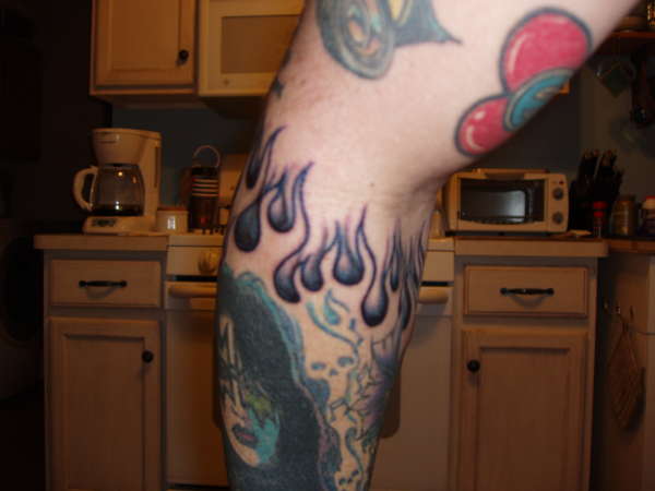 right forearm tattoo
