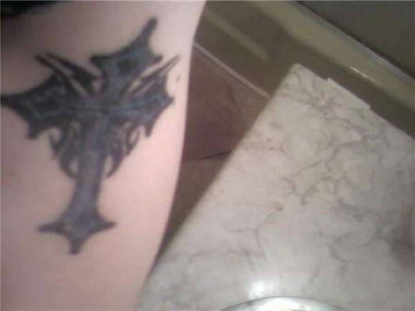 Tribal cross tattoo