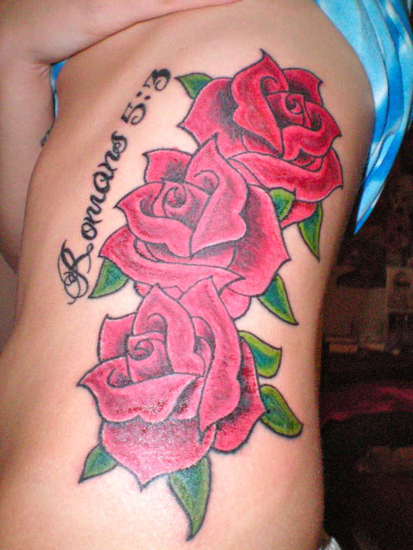 Roses, ribcage tattoo