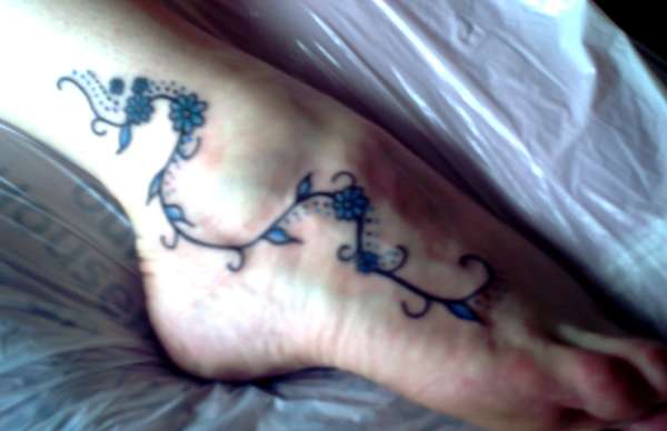 Curly Foot tattoo