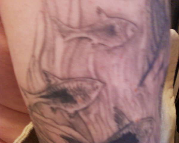 upper right arm tattoo