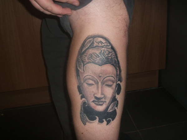 Buddha head tattoo