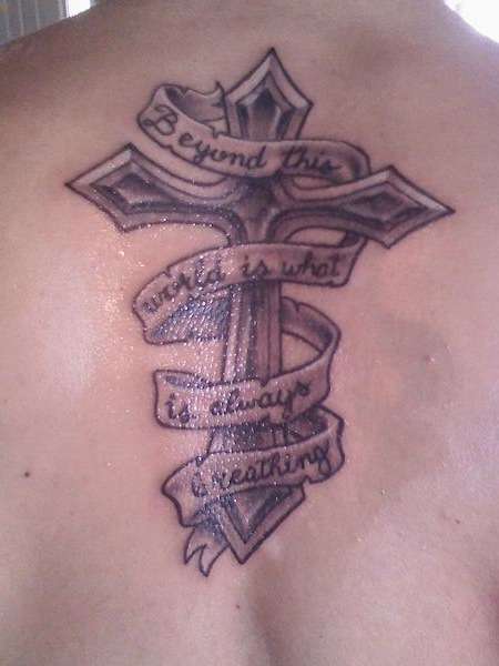 Cross "Beyond This World" tattoo