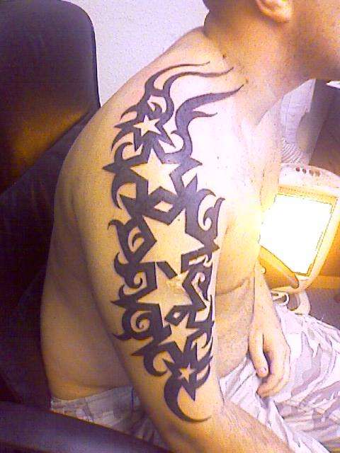 stars n tribal tattoo