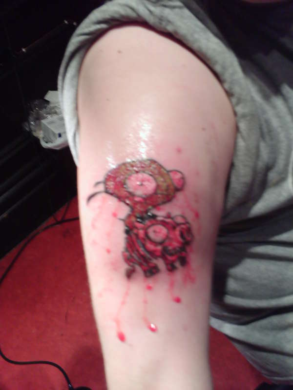 Gir on a skeleton piggy with my blood tattoo
