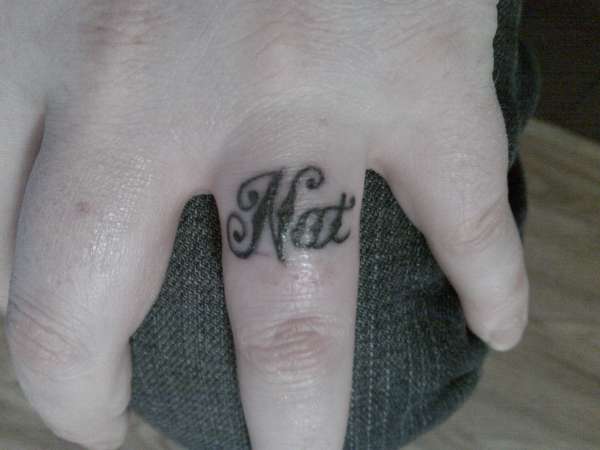 Wedding ring finger. tattoo
