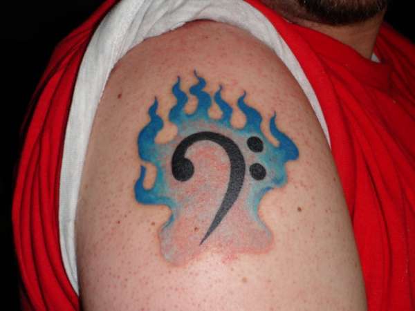 Bass Clef in Flames tattoo