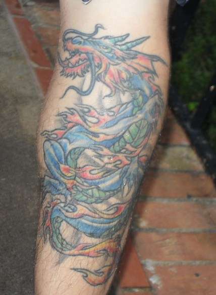 Dragon and flames tattoo