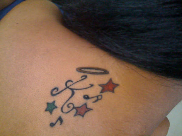 Initial & Stars tattoo