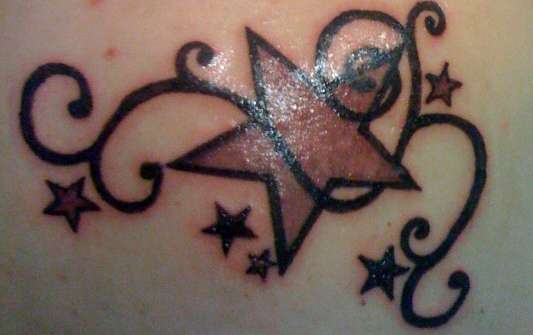 Star & tribal tattoo