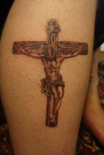 crusifix tattoo