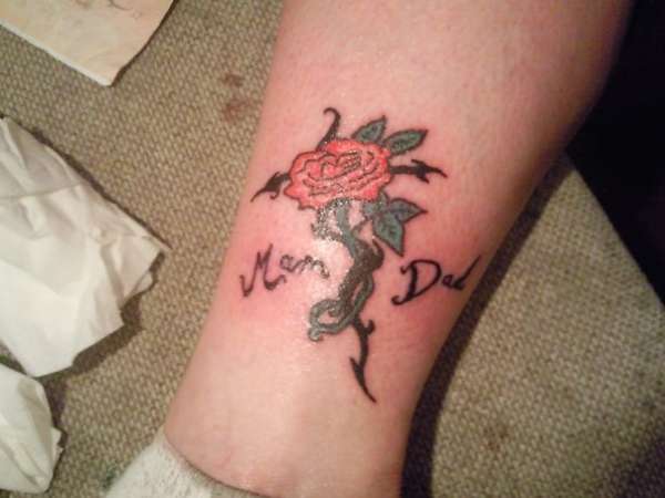 Rose on ankle tattoo