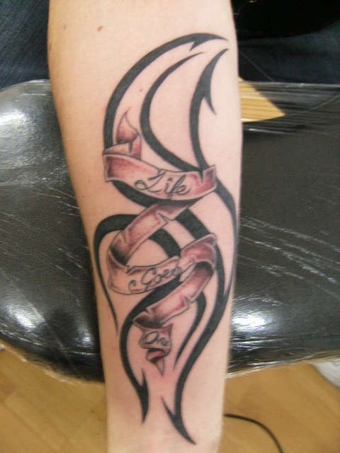 trible n names tattoo