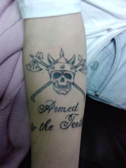 Armed to the Teeth tattoo