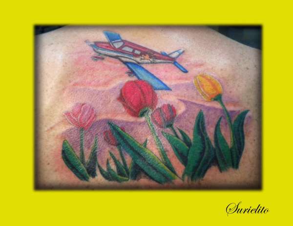 Airplane and tullips tattoo