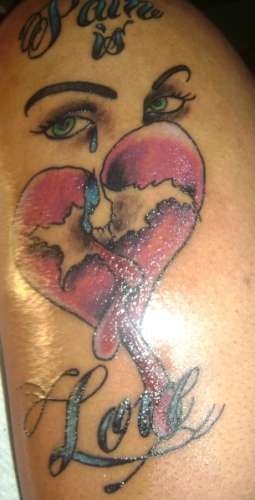 Pain Is Love tattoo