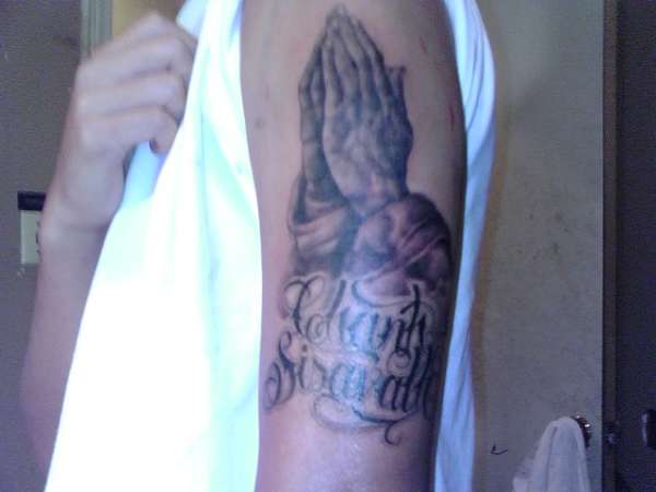 The Prayer Hands tattoo