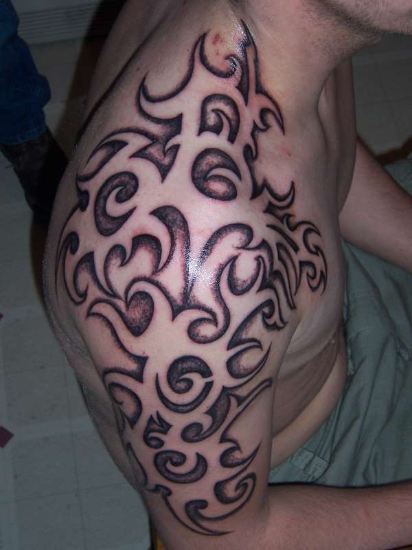 negative shaded tribal tattoo