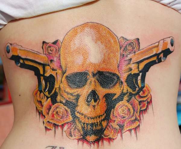 skull/guns tattoo