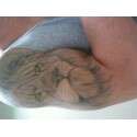 Lion finished with thriller eyes tattoo