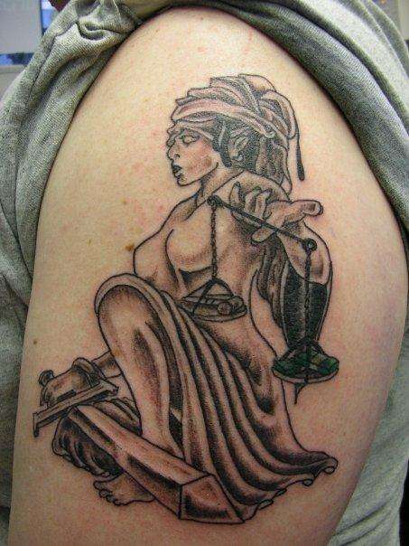 justice tattoo