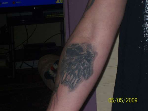 skull- right forearm. tattoo