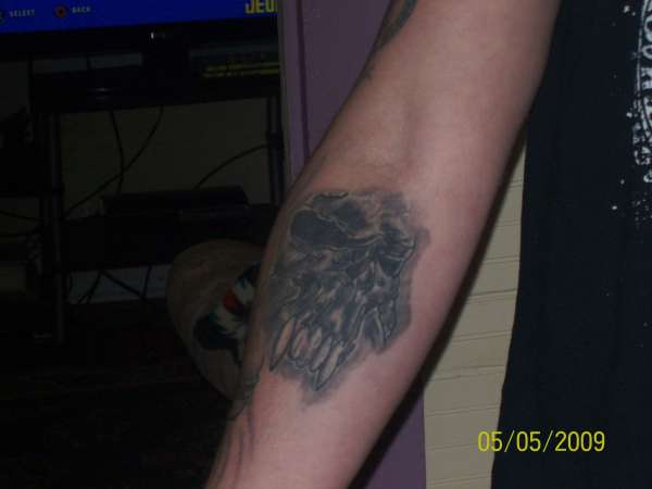 skull- right forearm. tattoo