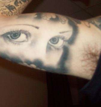 angel eyes tattoo