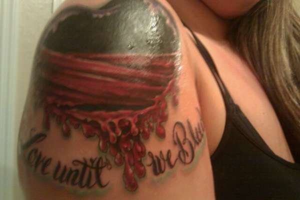 Bleeding heart tattoo