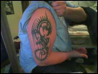 Tribal Dragon tattoo