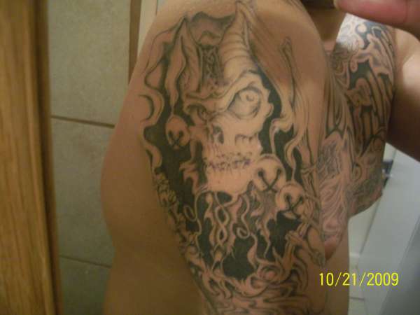 upper right arm tattoo